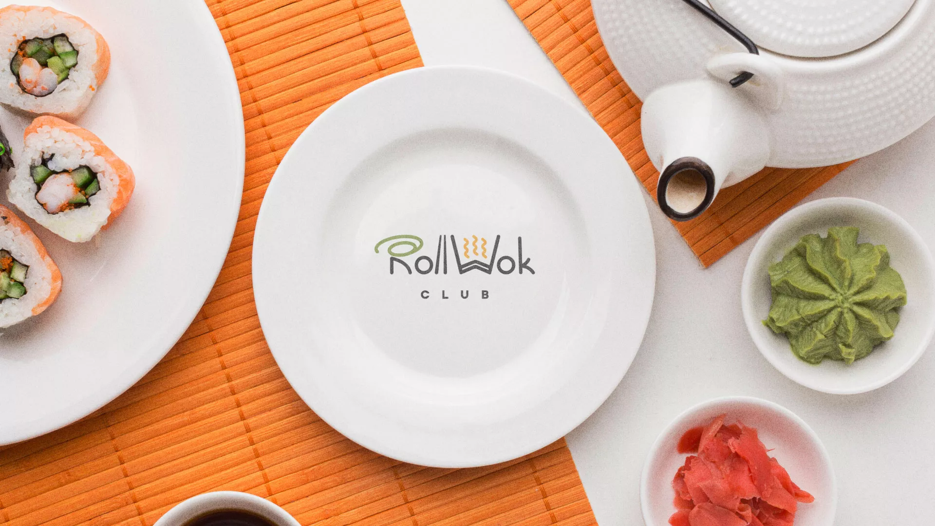 Разработка логотипа и фирменного стиля в Новой Ладоге для суши-бара «Roll Wok Club» Разработка логотипа и фирменного стиля в Новой Ладоге для суши-бара «Roll Wok Club»